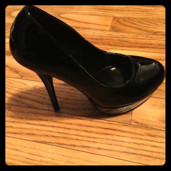 Size 7 black high heels. Wore only once brand new.
