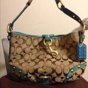 💯%Authentic Coach with dust bag. Price reduced!