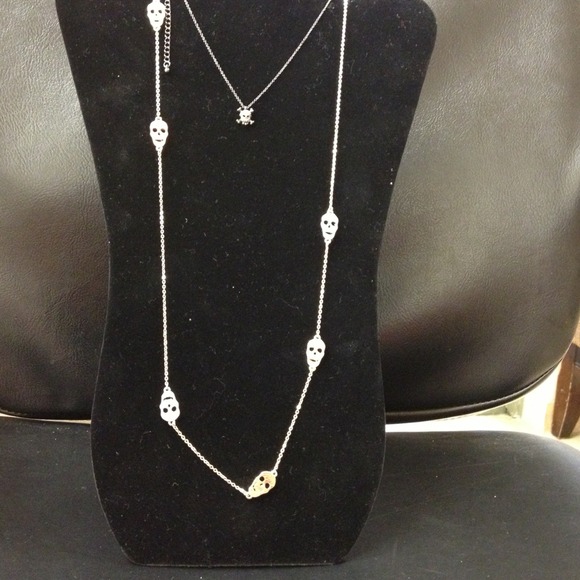 Sold. Gold long skill necklace