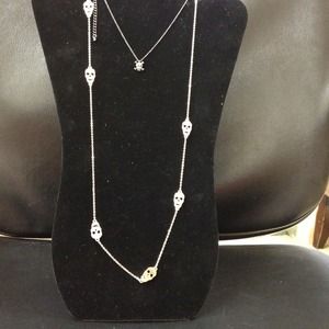 Sold. Gold long skill necklace