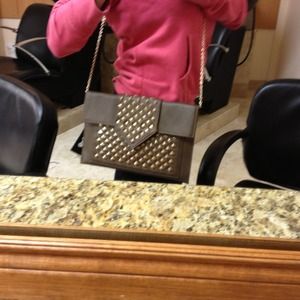 REDUCEDBrown with gold studs. Clutch or cross over