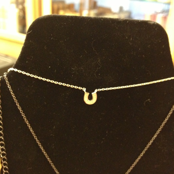 Silver tiny horse shoe. sOLD