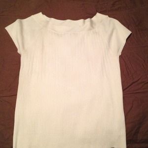 Cream colored shirt sleeve dress shirt