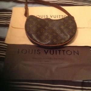Small Crescent Louis Vuitton purse.