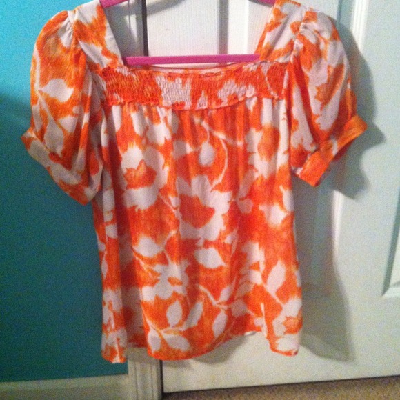 Orange and white short sleeved flower print top
