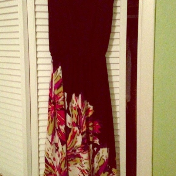 Sleeveless black dress with tie back