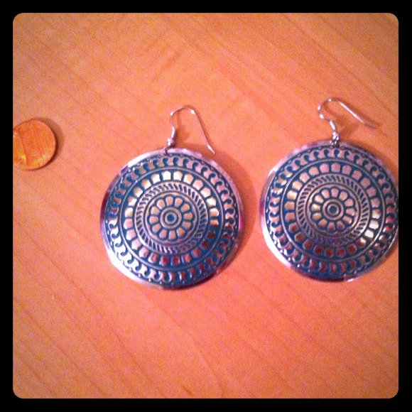 Large silver colored with blue design earrings!