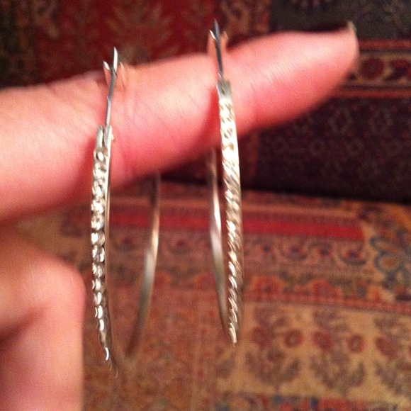 Large silver tone hoop earings