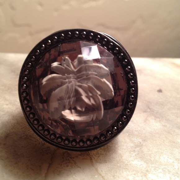 Large black and clear plastic ring