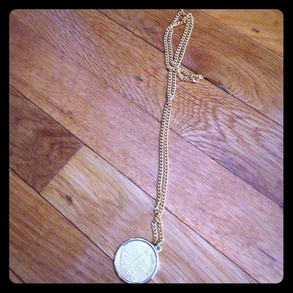 Gold lighthouse necklace