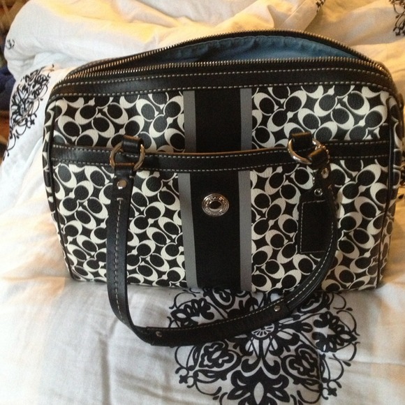 Coach Bag it is large brand new used twice!!