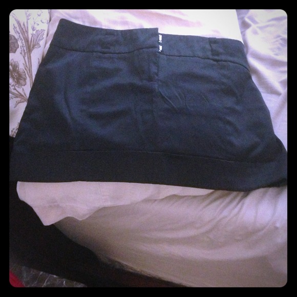 SOLD. Black satin mini skirt