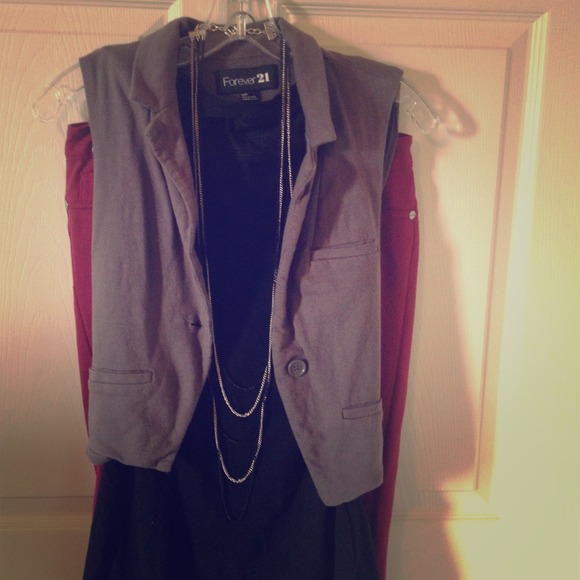 WILL NEGOTIATE. Grey Sleeveless Vest