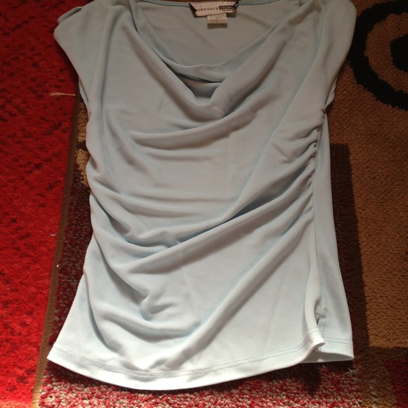 Pretty light blue shirt.