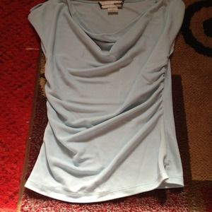 Pretty light blue shirt.