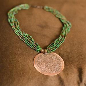 Beaded necklace with medallion. STUNNING!
