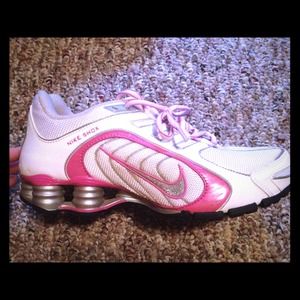 Pink and white Nike Shox