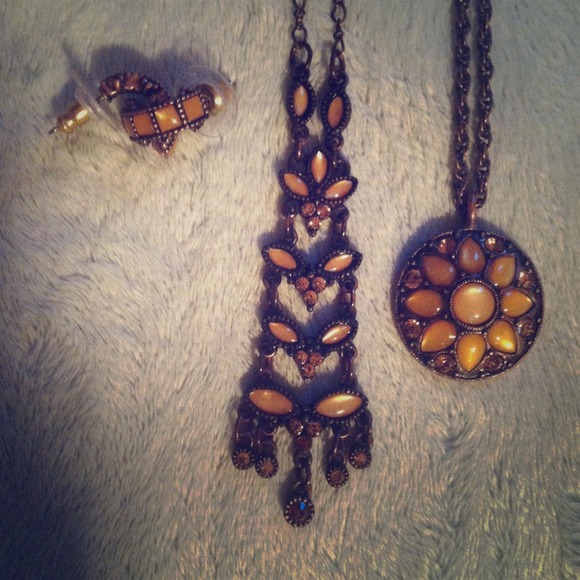 Two necklaces and a pair of earrings set