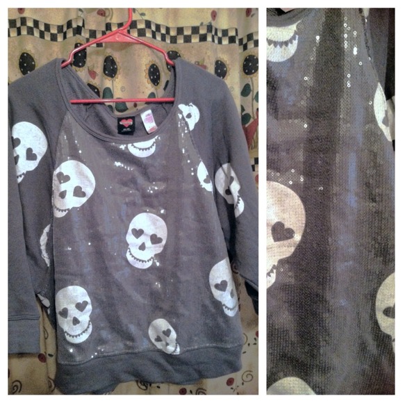 Sequin skull sweater top.