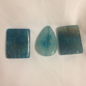 2 Turquoise colored stones  and 2 long sleeves!!