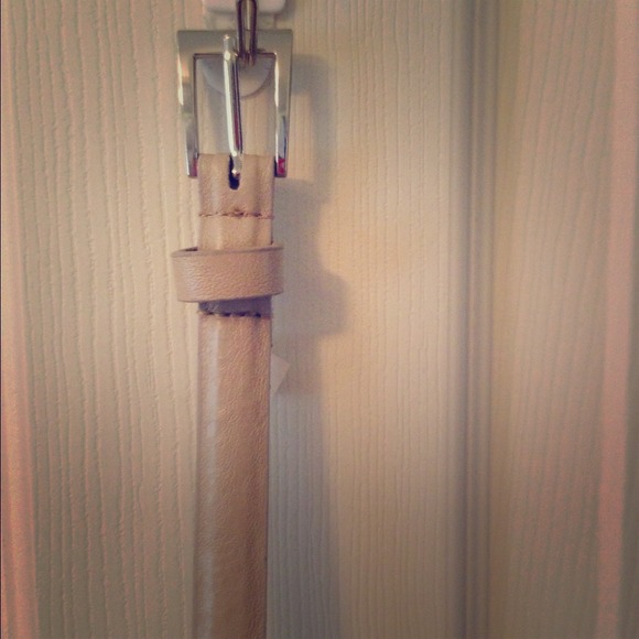 Skinny tan belt. Never worn.