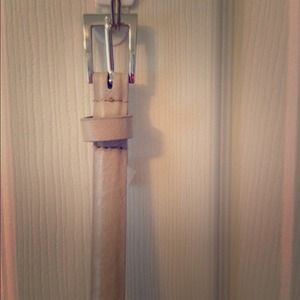 Skinny tan belt. Never worn.
