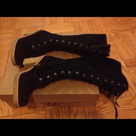 Brand new UGGS tall boots. Fux lace with side zip.