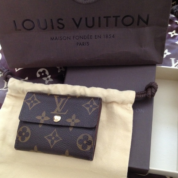 "Sold" Authentic Louis Vuitton Ludlow Wallet.