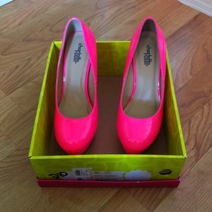 Neon pink pumps.
