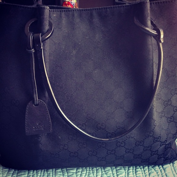 Authentic leather trim Gucci Bag.