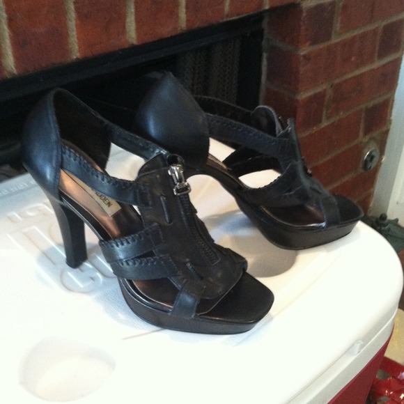 Black Steve Madden heels .