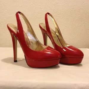 New red platform pumps