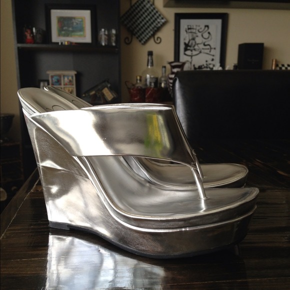 Silver Jessica Simpson platforms. Size 6B