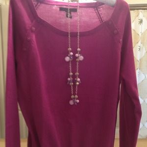 Sweater doesn't include necklace