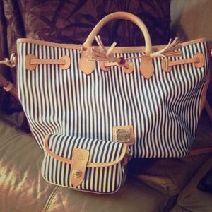 Dooney & Bourke purse and clutch. Never used.