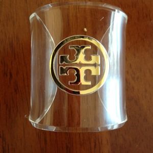 Tory Burch clear/gold lucite cuff bracelet.
