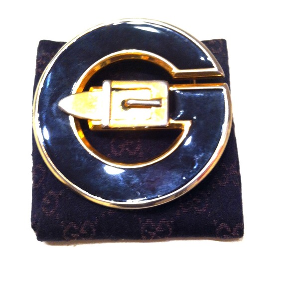 Gold Gucci belt buckle