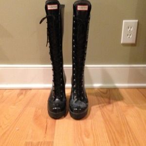 Black tall hunter boots lace up with heel