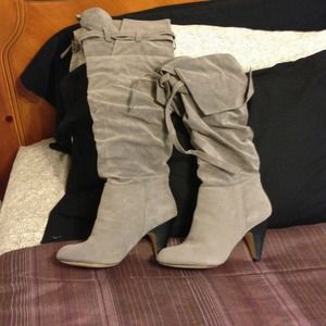Grey high/low suede boots.