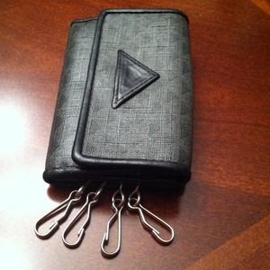 Key chain and coin holder.