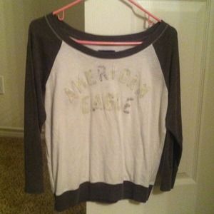 grey and white shirt