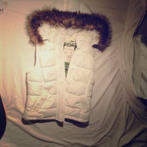 Puffer vest with detachable fur hood