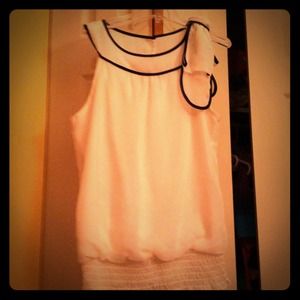 Oversized white shirt with black trim