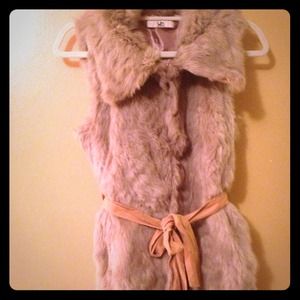 Beautiful fur vest with suede tan belt