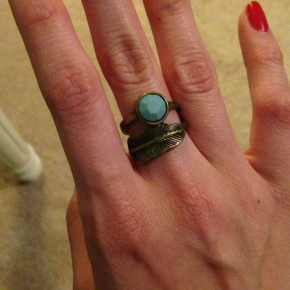 Turquoise stone and feather brass ring