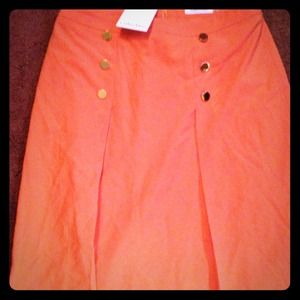 Cute orange skirt with gold buttons size 6