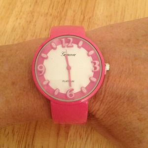 Pink bangle watch. Still has stem saver in it. New