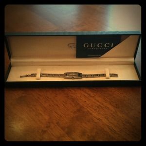 Gucci ladies silver watch