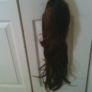 Synthetic clip on ponytail