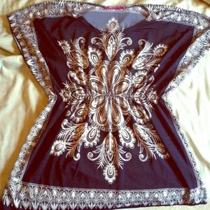 Blue tunic with modern pattern